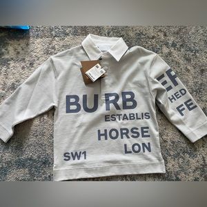 Kids Burberry long sleeve polo shirt In size 4Y.
